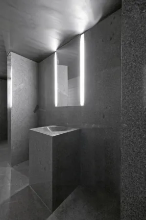 exhibition room with visible rocks