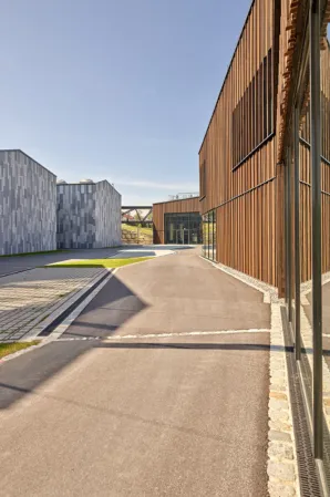 company premises with buildings clad in a natural stone façade