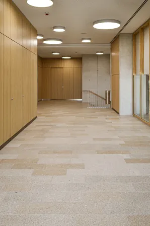 reddish-yellow flooring in a corridor