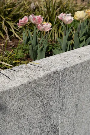 Detail shot of a retaining wall made out of solid granite
