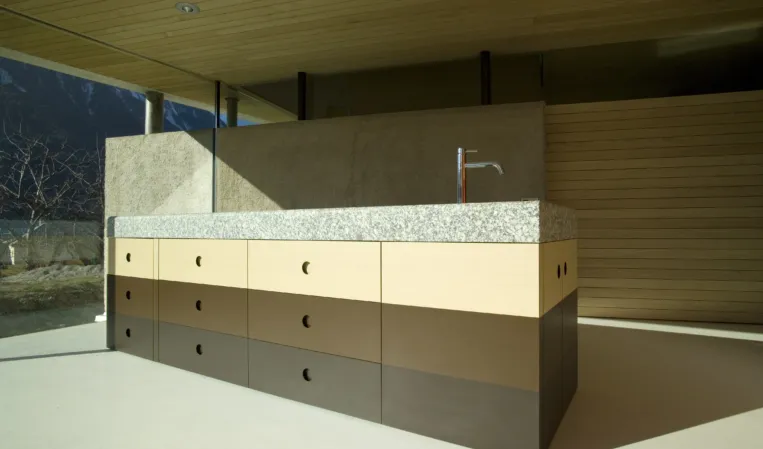 kitchenette with solid granite countertop