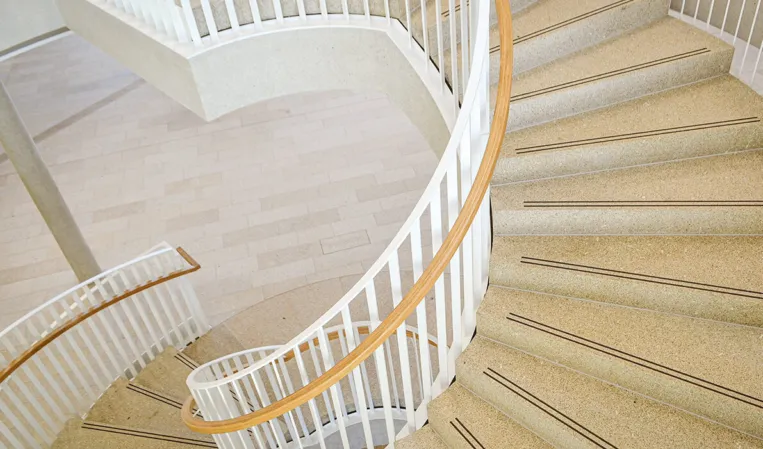 staircase made of solid yellowish natural stone