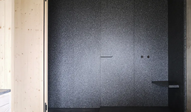 shower tray and shower wall made of dark granite