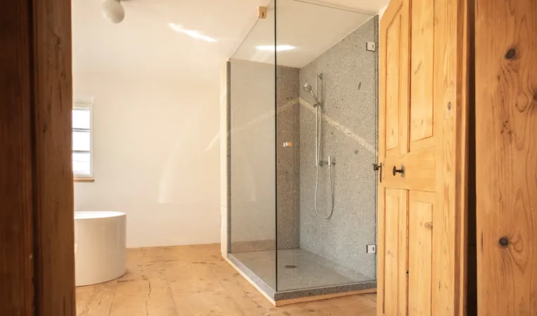 granite shower cabin in a historic building