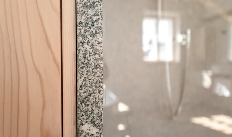 detail photo of a combination of granite and wood