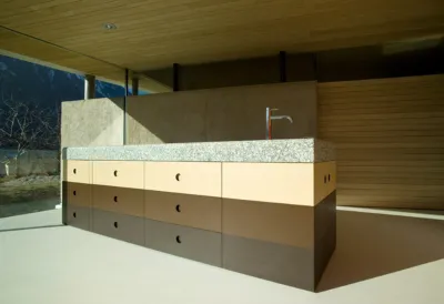 kitchenette with a solid granite countertop