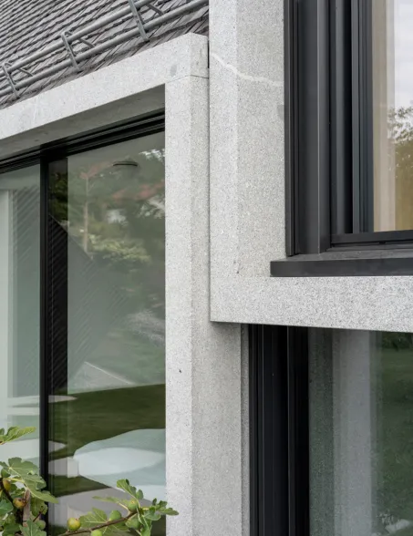 a detail shot of an architectural featutre show walls made out of solid granite